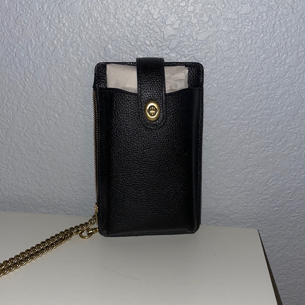 Coach black phone, card and coin holder.